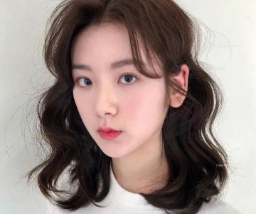 蛋卷头中长发图片 时髦洋气怎么烫怎么美